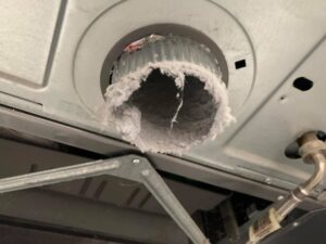 Heavily clogged dryer vent port with dangerous lint buildup | Dryer Vent Cleaning Apopka FL